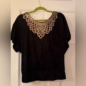 Elegant Black Top with Gold Detailing